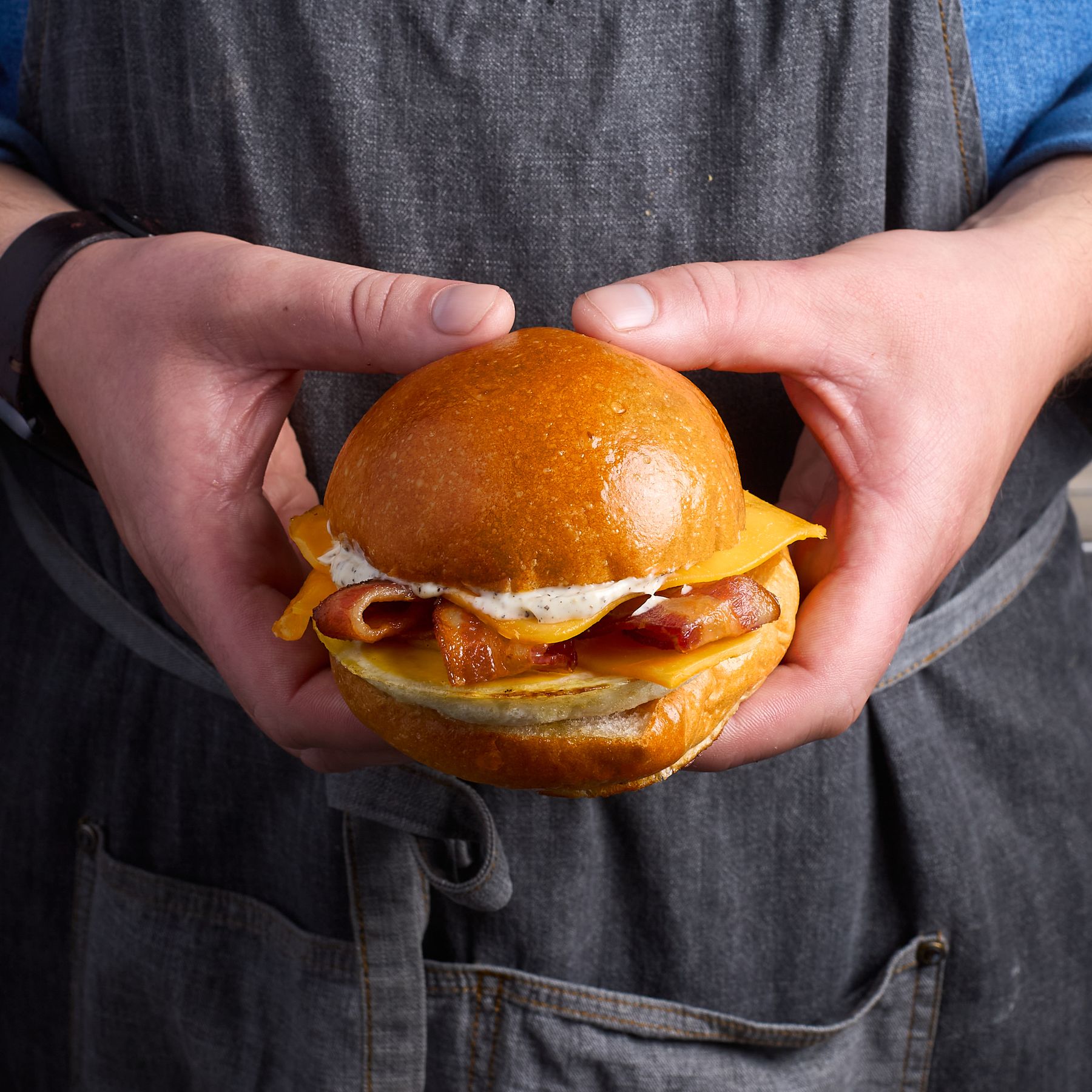 Bacon egg and cheese sandwich on milk bread bun